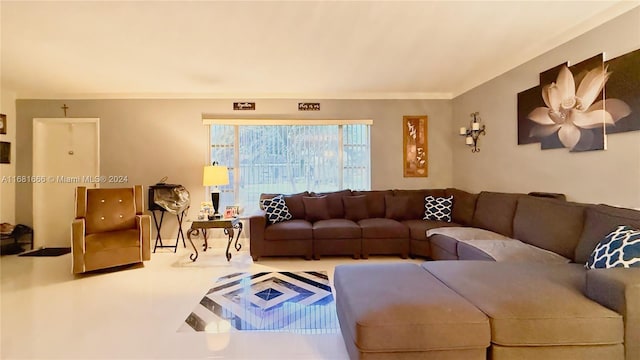 living room featuring crown molding and carpet flooring