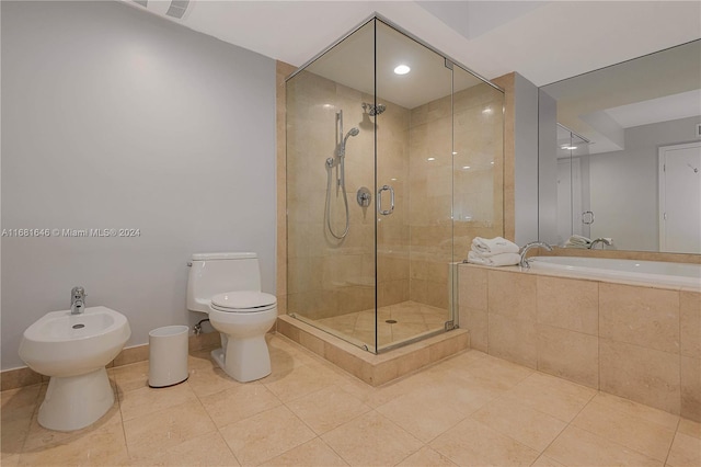 bathroom featuring a bidet, tile patterned floors, toilet, and separate shower and tub