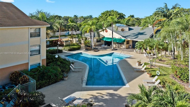 view of swimming pool with a patio area