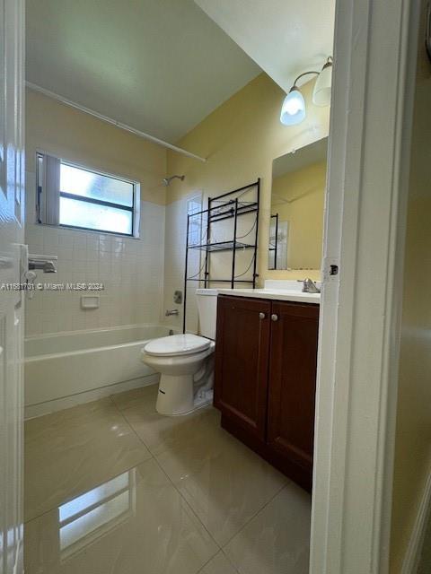 10018 NW 4th St Unit 203, Pembroke Pines, FL 33024 - full bath featuring vanity, tub / shower combination, and tile patterned floors