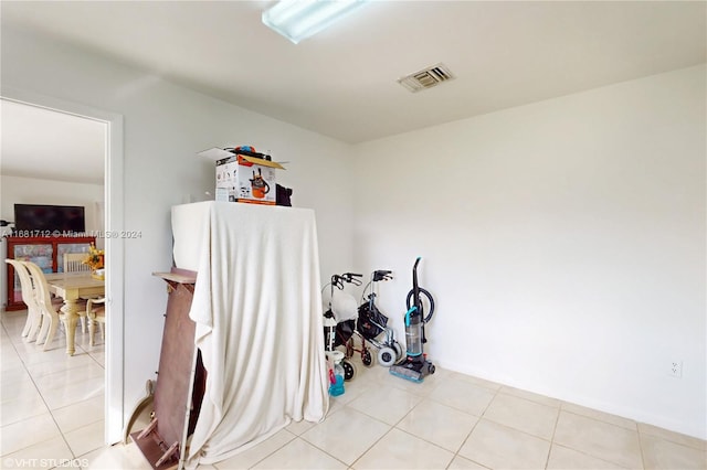 interior space featuring light tile patterned floors