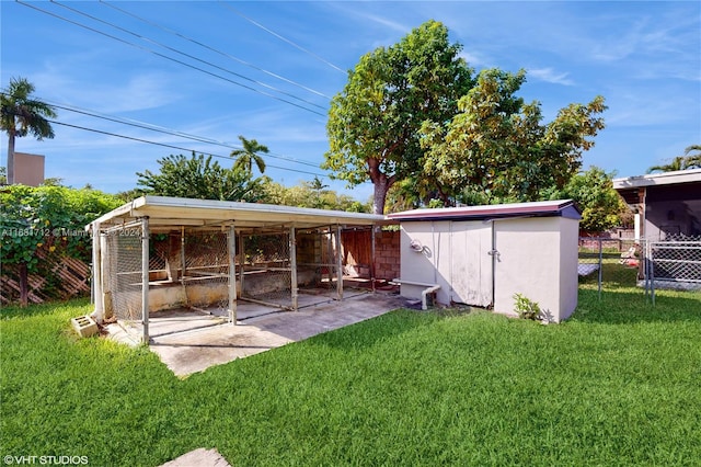 view of outdoor structure featuring a lawn