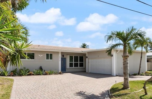 view of front of home with a garage