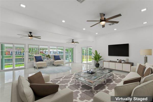 living room featuring ceiling fan