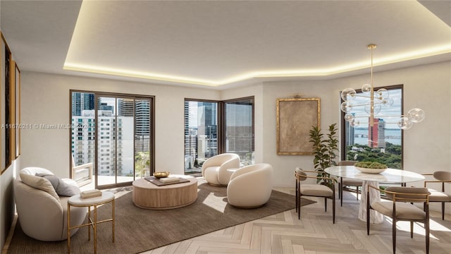 living area featuring a chandelier and light parquet flooring