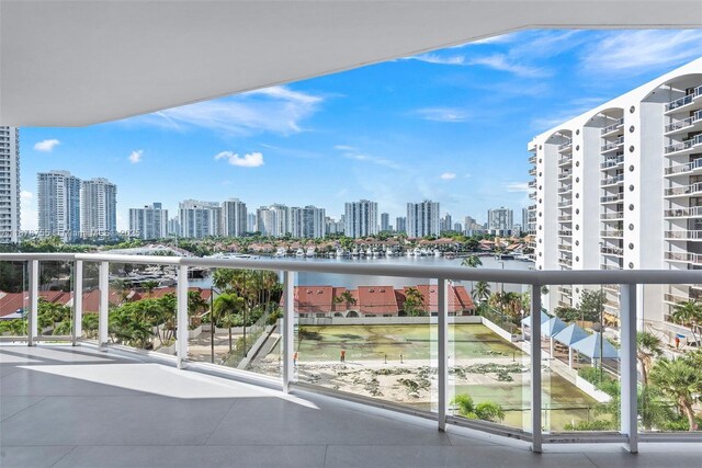 balcony featuring a water view