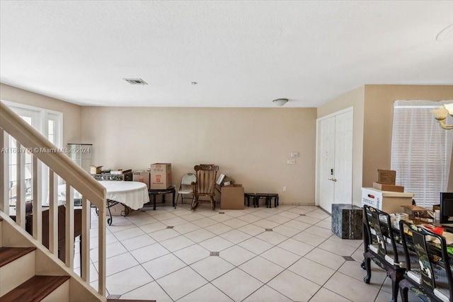 interior space featuring light tile patterned flooring