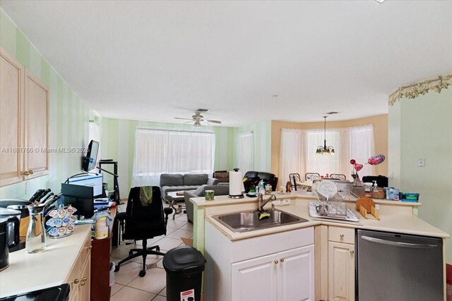 kitchen featuring sink, ceiling fan with notable chandelier, decorative light fixtures, stainless steel dishwasher, and light tile patterned floors