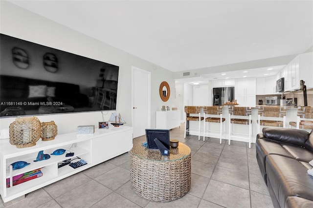 living room featuring tile patterned flooring