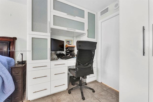 office area with light tile patterned floors