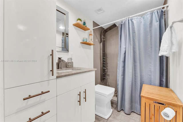 bathroom featuring vanity, curtained shower, toilet, and tile patterned flooring