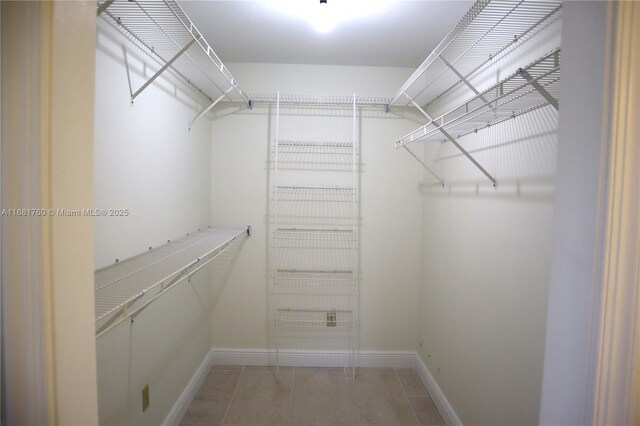 spare room featuring wood-type flooring