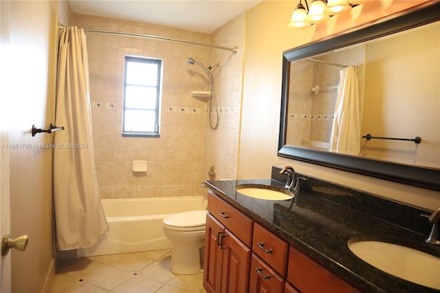 full bathroom with vanity, toilet, tile patterned floors, and shower / bath combination with curtain