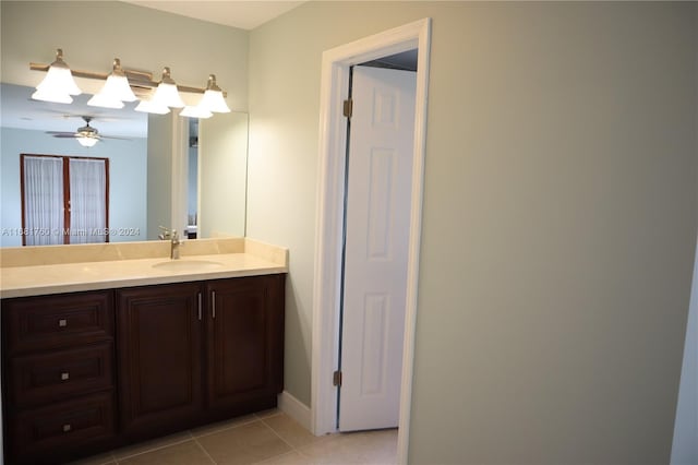 bathroom featuring vanity, tile patterned floors, and ceiling fan