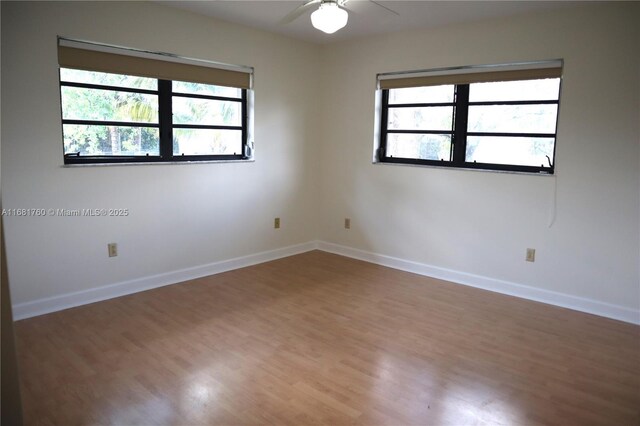 bathroom featuring ceiling fan, vanity, and tile patterned floors