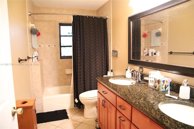 full bathroom featuring vanity, toilet, tile patterned floors, and shower / tub combo