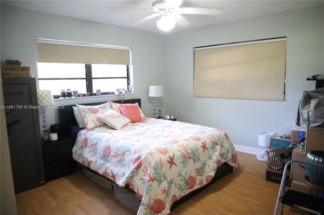 bedroom featuring ceiling fan and light hardwood / wood-style floors