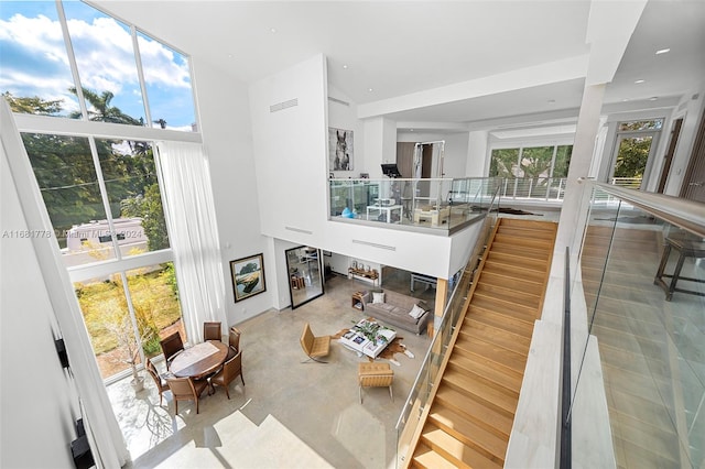 living room with a high ceiling