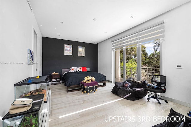 bedroom featuring light hardwood / wood-style flooring