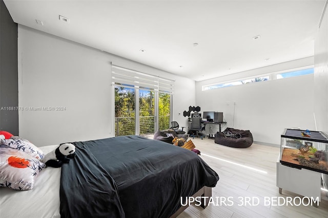 bedroom featuring light wood-type flooring