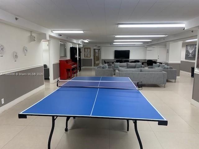 100 Lincoln Rd Unit 512, Miami Beach, FL 33139 - recreation room featuring tile patterned floors and baseboards