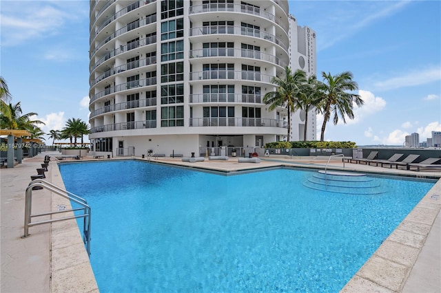 view of swimming pool featuring a patio