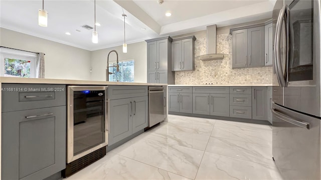 kitchen featuring beverage cooler, wall chimney exhaust hood, plenty of natural light, gray cabinets, and stainless steel fridge