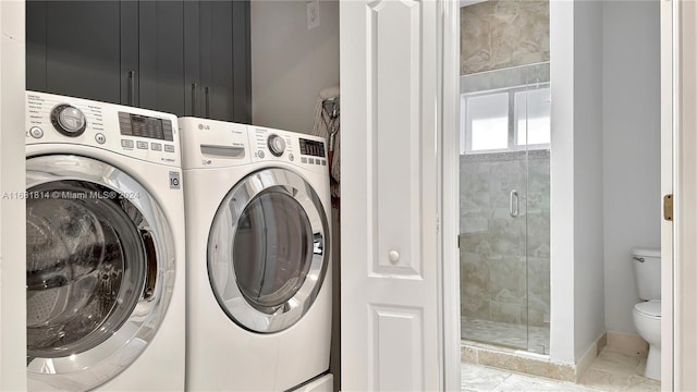 laundry room with washer and clothes dryer