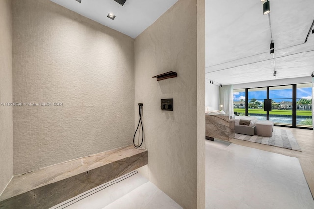 bathroom featuring concrete flooring