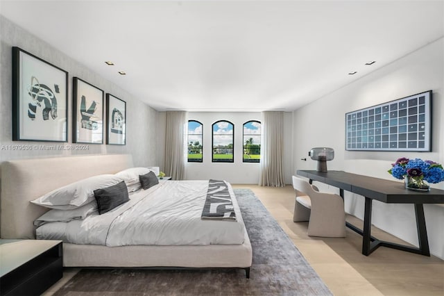 bedroom with light wood-type flooring