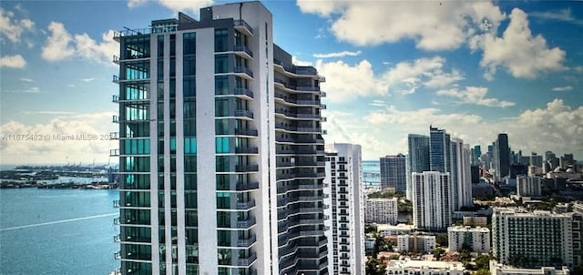 view of building exterior featuring a water view