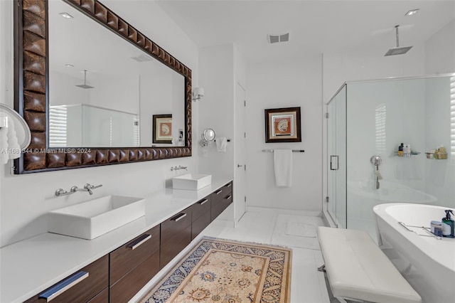 bathroom featuring vanity, plus walk in shower, and tile patterned floors