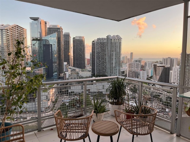 view of balcony at dusk