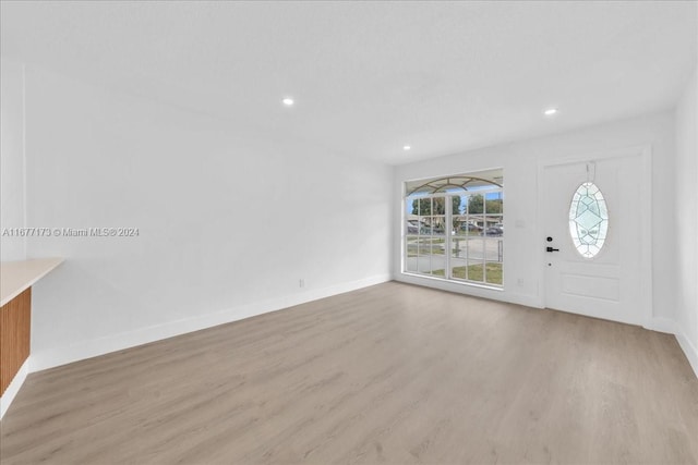 entrance foyer featuring light hardwood / wood-style floors