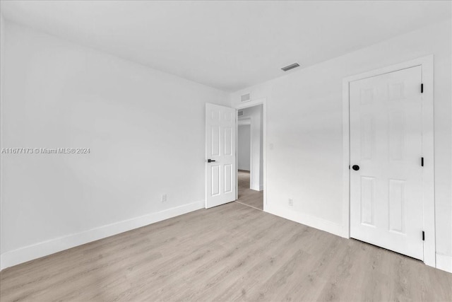 unfurnished bedroom featuring light hardwood / wood-style flooring