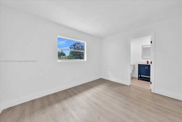 unfurnished room featuring light hardwood / wood-style flooring