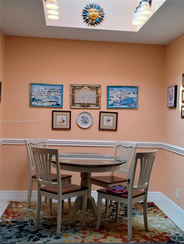 dining area with tile patterned floors