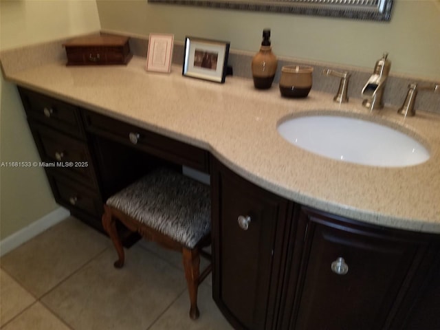 bathroom featuring sink and tile patterned floors