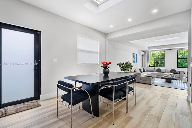 dining space featuring light hardwood / wood-style floors