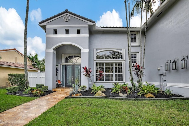 view of front of home featuring a front lawn