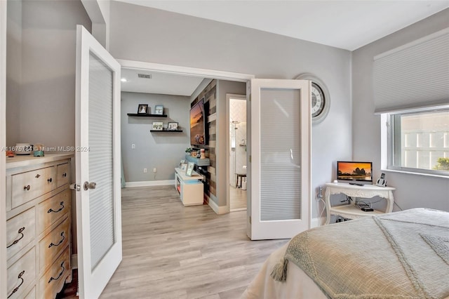 bedroom featuring light hardwood / wood-style floors