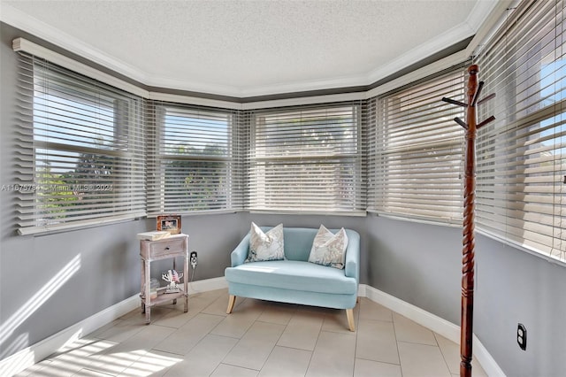 sitting room with crown molding, a textured ceiling, and light tile patterned flooring