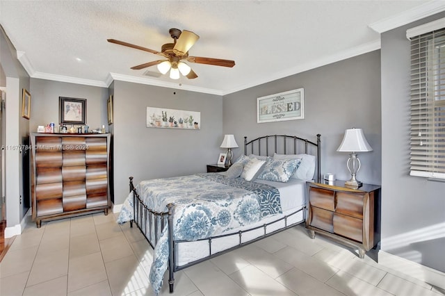 tiled bedroom with ceiling fan, crown molding, and a textured ceiling