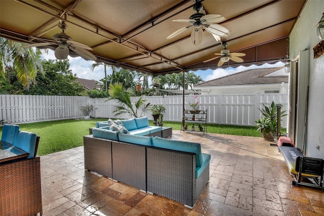 view of patio featuring outdoor lounge area and ceiling fan