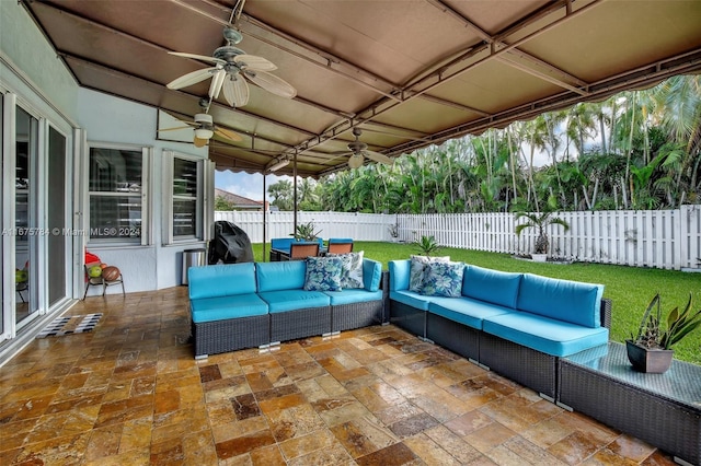 view of patio with ceiling fan, grilling area, and outdoor lounge area