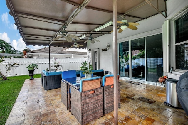 view of patio featuring an outdoor living space and ceiling fan