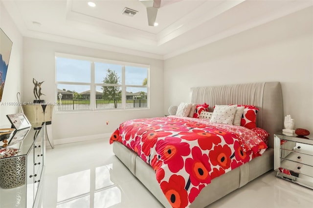 bedroom featuring a raised ceiling