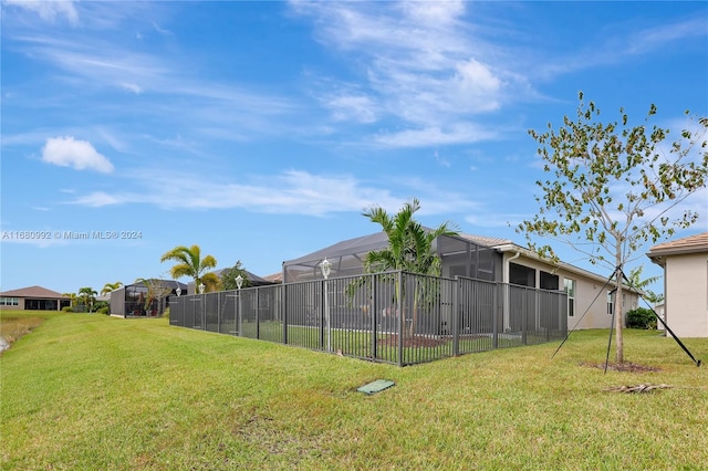 view of yard featuring a lanai