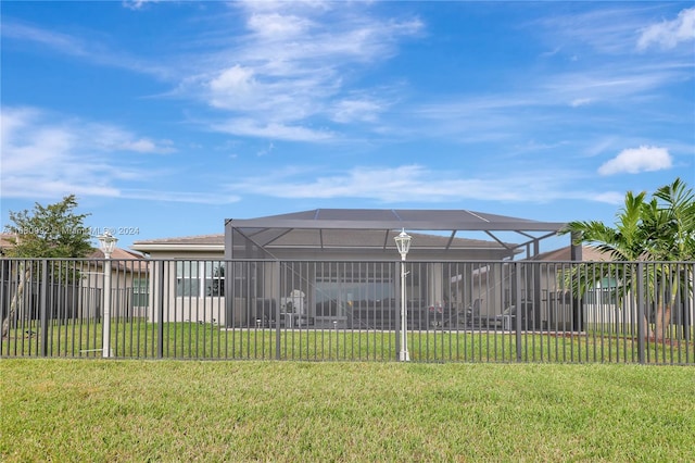 view of yard featuring a lanai