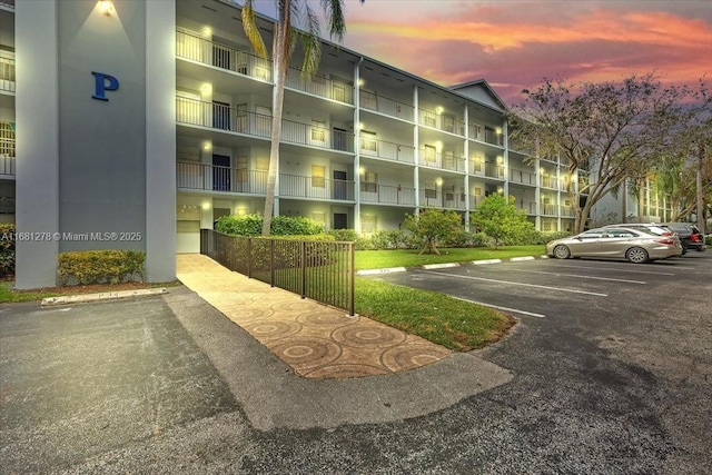 view of outdoor building at dusk